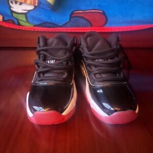 Jordan Kids Bred 11’s Black and Red Sneakers